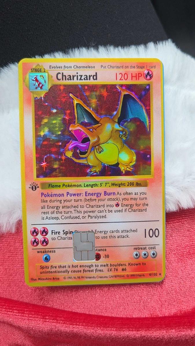 Item: first edition Charizard small chip  