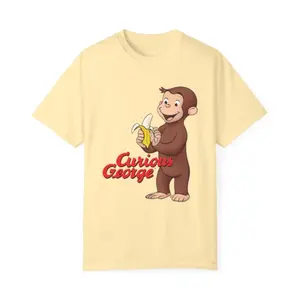 Youth + Adult Curious George Peeling a Banana Modern Cartoon with Logo Unisex Comfort Colors Short Sleeve Tee