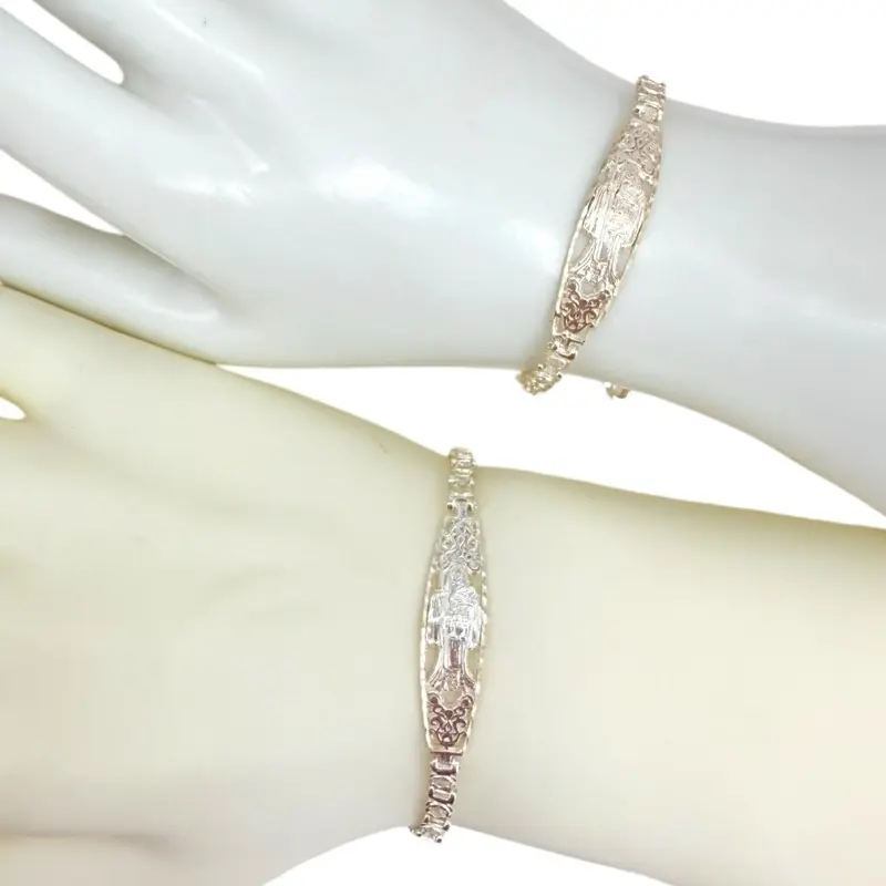 Santa Muerte bracelet with clear cubic zirconia stones made of 925 sterling silver. Elegant design for stylish wearers.