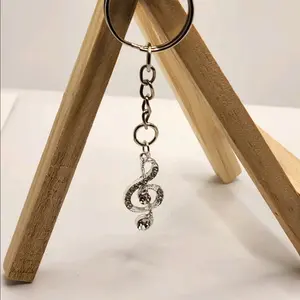 Music Note Keychain for On-the-go Music Lovers - Durable Stylish Fashion Accessory with Classic Design and Secure Fit