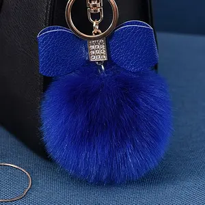1 Piece Sparkling Bows and Fluffy Pom Pom Keychain - Cute Blue Faux Rabbit Fur Ball with Rhinestone Embellishments, Gold Chain Link - Perfect for Bag Charms and DIY Projects, Rabbit Accessories