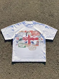 White Union Jack Travel Stamp Graphic T-Shirt | Short Sleeve Crew Neck Tee | Vintage European Hotel & City Print | Retro Streetwear for Men & Women | Wanderlust Aesthetic Tops for Summer & Everyday Wear
