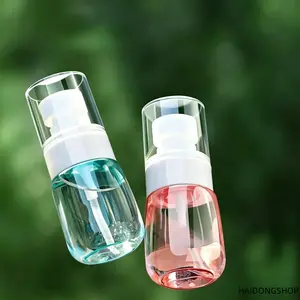 Portable refillable fine mist travel spray bottle, leakproof airline‑approved cosmetic dispenser vial, thick food‑grade clear pastel PET atomizer with dust cap, available in three sizes (30 ml, 60 ml, 100 ml), multi‑liquid storage container for toner, per