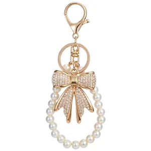 1Pc White Rhinestone Bowknot Keychain Imitation Pearl Chains Sparkly Bow Purse Charm Bag Charms for Handbags Purse Backpacks Handbag Charms Keychain Accessories for Women