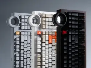 The ATM 98 features an ultra-quiet creamy typing experience, a star ring knob, and tri-mode wireless connectivity.