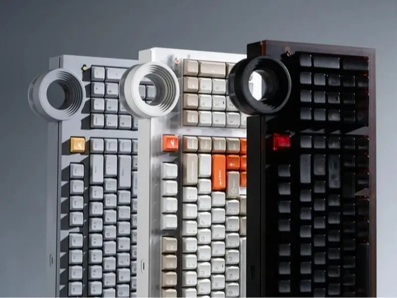 The ATM 98 features an ultra-quiet creamy typing experience, a star ring knob, and tri-mode wireless connectivity.