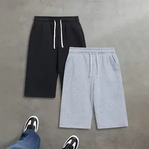 Men’s 2-piece summer set featuring a solid-color, simple three-quarter shorts; casual, loose, versatile, trendy high-street/street-style pants for men—handsome wear.