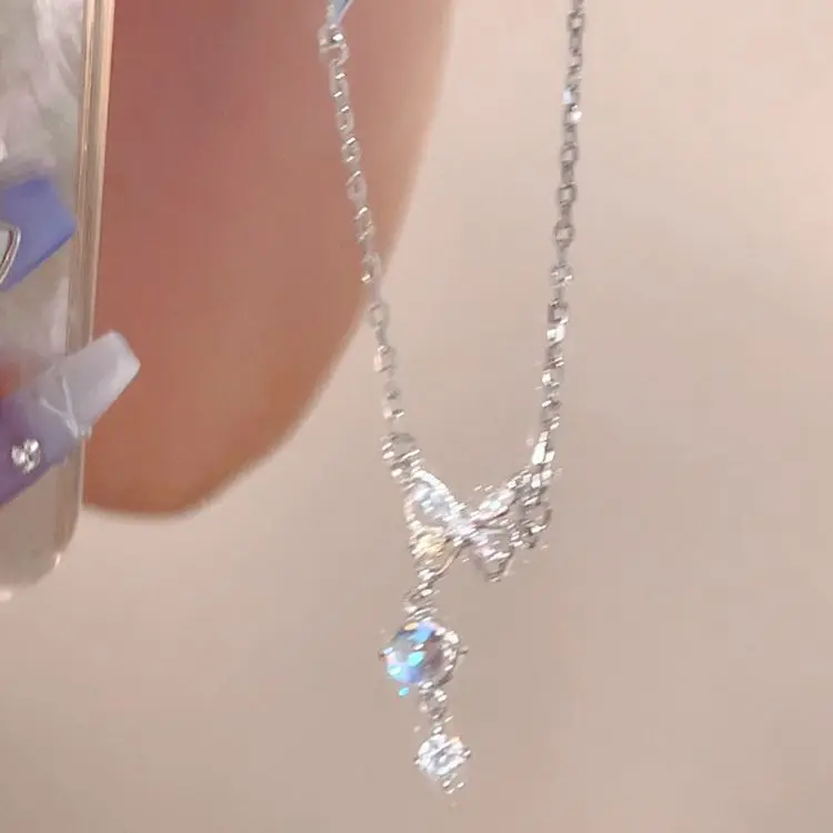 XL 244 bow tassel necklace