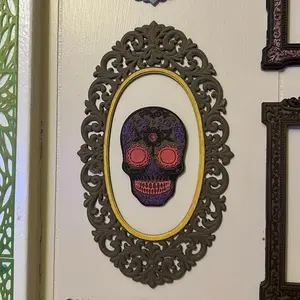 Vintage Oval Skull Wall Art Gothic Painted Frame Decor with Intricate Design and Colorful Skull