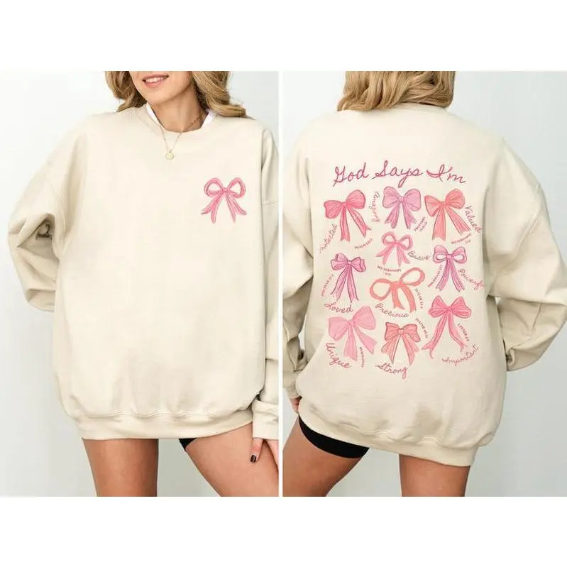 God Says I Am Coquette Sweatshirt – Christian Balletcore Sweater with Pink Bow, Perfect Gift for Women