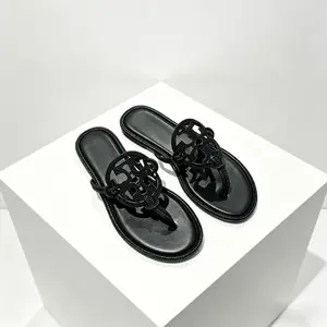 Classic Black Patent Leather Flip Flops with All-Over Rhinestone Trim & Cutout Logo for Casual & Dressy Looks