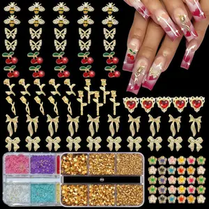 120 Pcs 3D Gold Nail Charms Set Including Bees, Butterflies, Cherries, 3 Types of Roses, Luxurious Hearts, Bows, and Gold Ribbons, Plus a Box of Gold Rhinestones & 6-Compartment Flowers