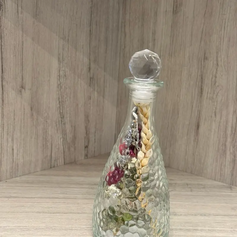 Crystal Bottle with Preserved Nature - Clear Glass Bottle with Decorative Elements and Glass Flower Accent
