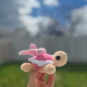 Hand crocheted turtle with bow shell