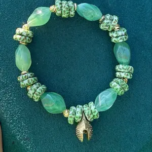 Green Goddess Bracelet - Green Beaded Design with Gold Accents and Unique Charm