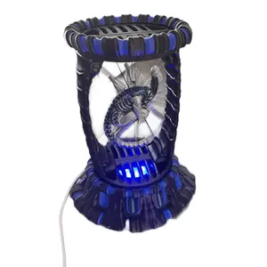Alien Display - Blue Ceramic Design with Unique Pattern and Black Accents