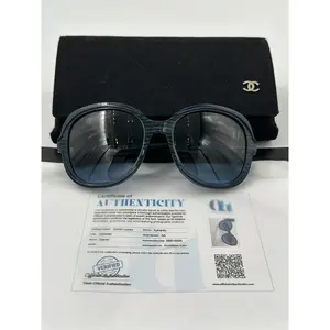 Pre-owned Oversized Chanel Sunglasses with Blue Printed Frames and Official Authentication