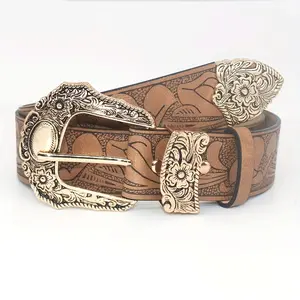 Brown Vintage Embossed Flower Belt with an vintage Bronze Buckle, a Retro Waist Belt for Women Featuring a Flower Buckle. Stylish And Versatile, Perfect for Pairing with Jeans, Dresses, Or Shirts. A Great Accessory for And an Ideal Gift for Holidays