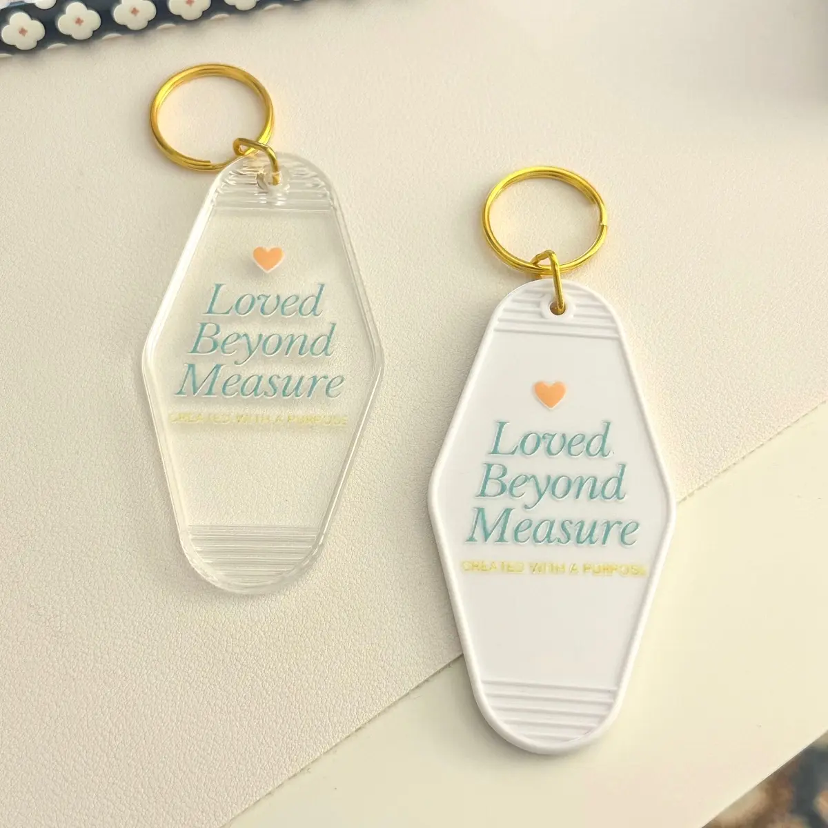Loved beyond measure motel keychain