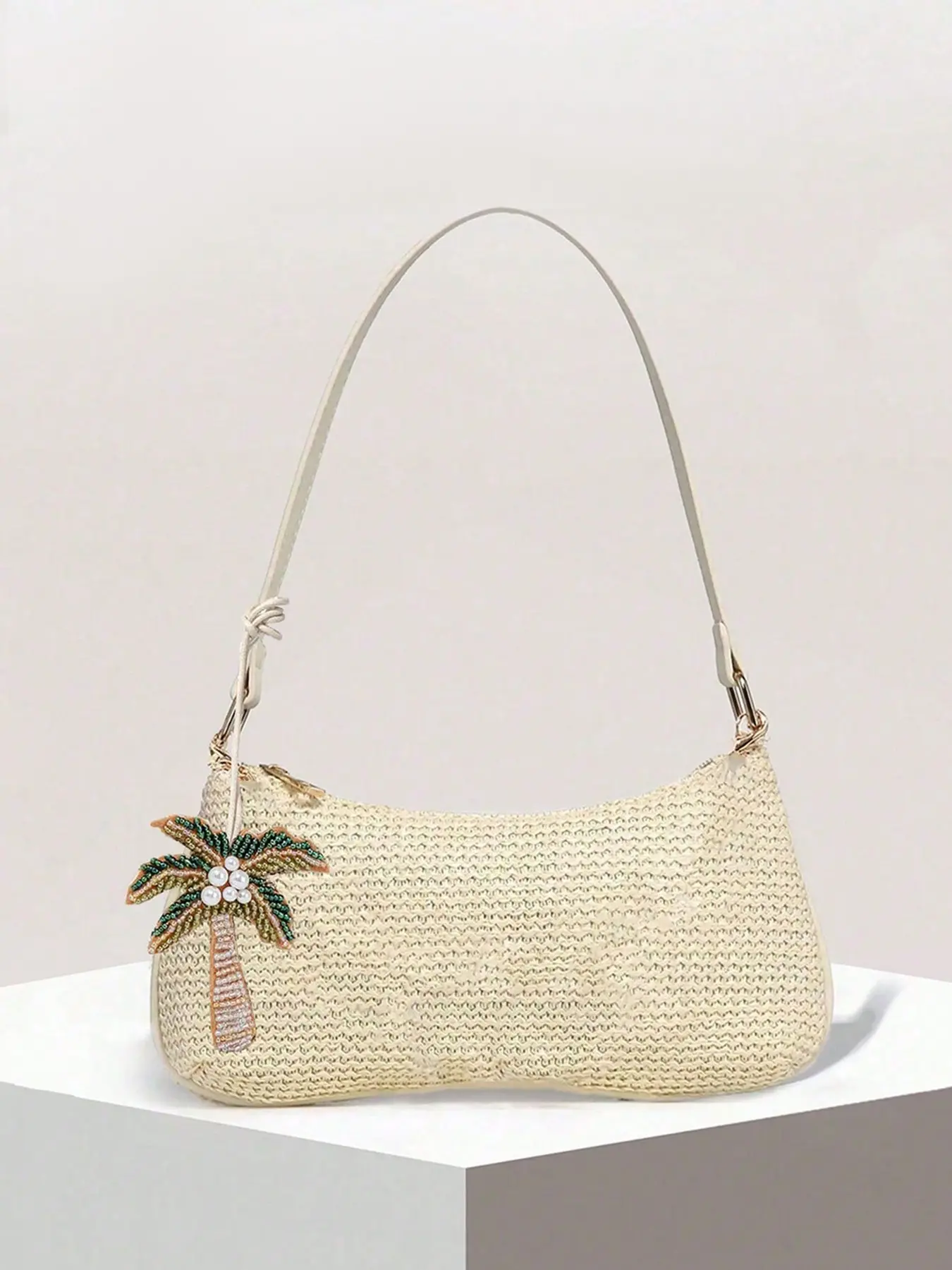 A niche design seaside vacation style woven armpit bag with coconut tree pendant decoration, fashionable retro simple casual versatile texture single shoulder bag, Crossbody Shoulder Purses, suitable for commuting and shopping.
