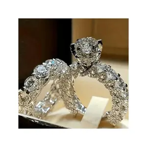Set of 2 elegant CZ engagement rings featuring bright round cubic zirconia—romantic, luxurious, symbolic jewelry for a wedding party