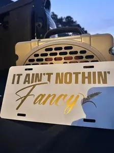 It Aint Nothing Fancy Front License Plate - 12x6 Inches, Weather Resistant, Handmade in the USA, Humor Decal for Trucks & Cars, Easy Installation