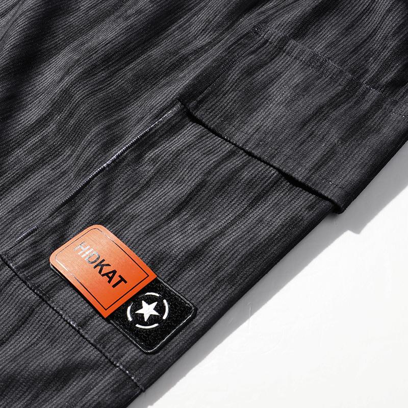 Men’s casual shorts—loose and comfortable, versatile design featuring a trademark graphic, elastic waistband with drawstring, American retro style, suitable for all seasons, ideal for outdoor leisure activities.