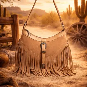 Tan Fringe Bag with Buckle Detail and Long Straps for Everyday Use