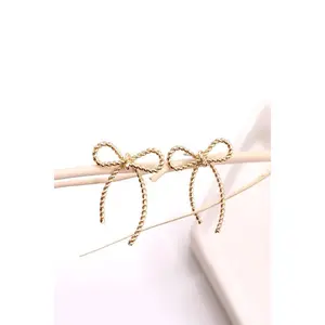 THE ROPE BOW EARRINGS IN GOLD