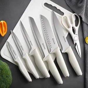 15-piece kitchen knife set with knife block and built-in sharpener, safe to use in dishwasher, anti-slip handles, white