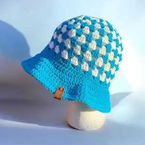 Crochet Bucket Hat with Blue and White Checkered Pattern and Brown Leather Tag