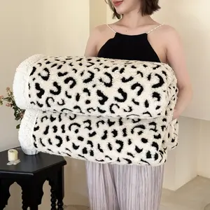 A white double-layered leopard-print blanket: warm and cosy, soft and comfortable, stylish and versatile. Perfect as a bedspread for the bedroom, available in a range of sizes. Unique and innovative, making it an ideal festive gift. Heavyweight (450 gsm)