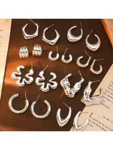 European and American C-shaped floral irregular acrylic earrings, high-end light luxury niche studs with a cool and elegant feel