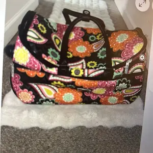 Vera Bradley Purple Punch Suitcase with Wheels, Featuring Floral Patterns, Ideal for Travel and Daily Use