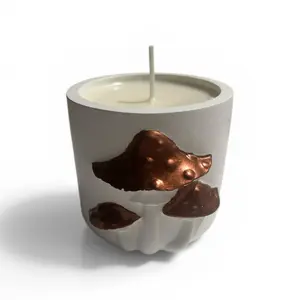 “JOLEN”Mushroom”Candle.handmade candle.Crafted 100/soy wax.Warm Rustic Wood fragrance oil. Height-3,5 in .inspired forest aesthetic the mushroom-shaped design brings warmth and charm to any interior making it perfect both a home decor and as a gift.