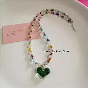 Fashionable millennium handmade strawberry heart-shaped pendant pearl necklace, a sweet and cute scene of a lady's Gothic style, Emo jewelry accessories from the year 2000