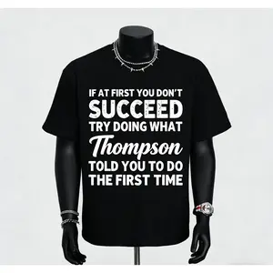 IF AT FIRST YOU DON'T SUCCEED TRY DOING WHAT Thompson TOLD YOU TO DO THE FIRST  Black T-shirt with the design printed on the front