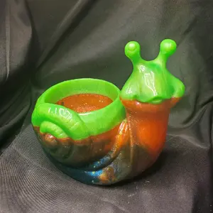Introducing the whimsical and charming Snail Planter – a delightful addition to any garden or indoor space! Crafted with care from high-quality epoxy in a unique snail shape, this planter adds a touch of whimsy to your greenery