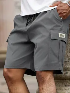 Men's cargo shorts with letter patches, flap closure, multiple pockets, drawstring waist, loose fit, casual style, Casual Fashion Shorts