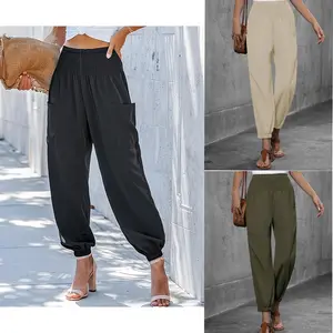 Casual High-Waisted Jogging Pants for Women Featuring a Solid Color, Pleats, Side Pockets, And an Elastic Waistband for a Loose And Soft Fit.