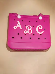 Pink letter-hole bag accessory, inserts personalized letters AZ, cartoon Bogg beach bag decoration accessory, DIY detachable decorative buckle, shoe-hole letter decoration, suitable for rubber beach tote bag, beach essential, Trendy Bag Charms