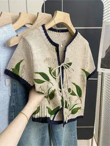 Women's khaki bohemian vacation short-sleeve knit top. Loose round neck, contrast green leaf print, front tie and contrast piping. Comfortable for spring & summer casual wear, Casual Chic