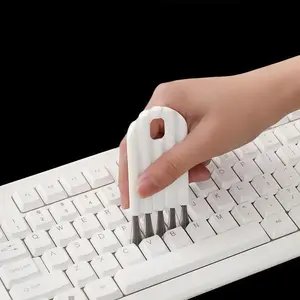 4 keyboard crevice cleaners, soft bristle brush head, plastic handle, compact design, lightweight and portable, strong durability, ergonomic grip, simple white design, reusable, car interior cleaning tools, home cleaning products, portable mini brush
