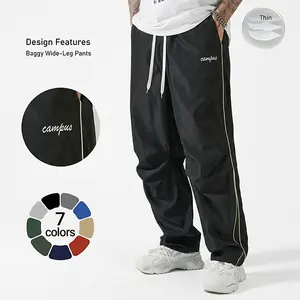 Men’s baggy wide-leg pants | Clean-fit tracksuit bottoms with side stripe and gold piping | Lightweight streetwear sweatpants for summer plad pants