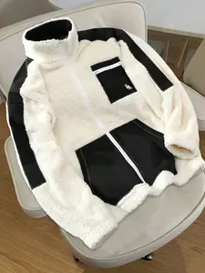 Men's youthful and stylish casual knitted cardigan sweatshirt, fashionable patchwork lamb fleece jacket, featuring patchwork design, comfortable and warm material, practical pockets, and exquisite zipper decoration, suitable for fashionable outfits.