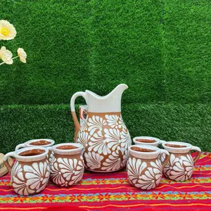Relieve Pitcher Color Terracota Blanco Set Mug. Relieve Pitcher Color Terracota Blanco Set Mug.