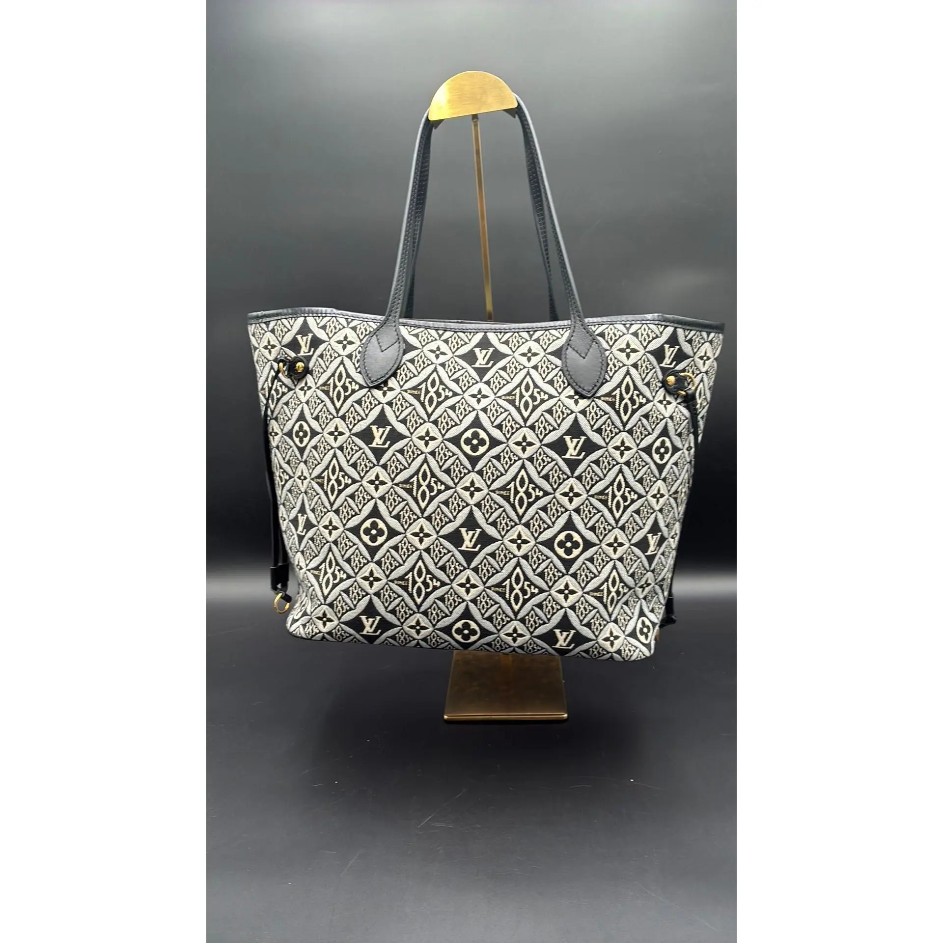 Pre-owned Louis Vuitton Leather Luxury Bags & Accessories Limited Edition Jacquard Since 1854 Neverfull MM Bag, Black Date Code: CA3250G. Entrupy ID: 4RWD99K.