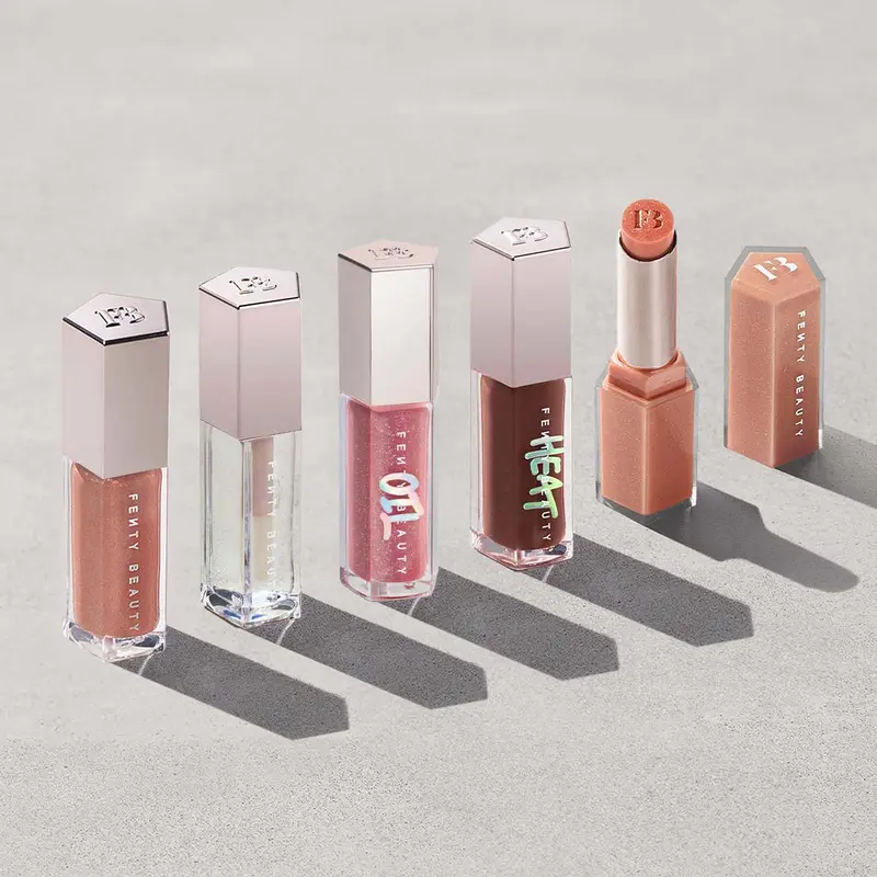 Fenty Beauty 5-Piece Lip Gloss Vault: Gloss Bomb Lip Luminizer, Gloss Bomb Heat Lip Luminizer + Plumper, Gloss Bomb Oil Luminizing Lip Oil 'N Gloss, Gloss Bomb Stix Shimmer High-Shine Gloss Stick