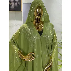 Sparkling Sequins And Rhinestones in a Spring Collection Featuring a Loose, Trendy Cape with Bell Sleeves, Inspired by Middle Eastern, African, And Southeast Asian Styles. Fit Womenswear Aesthetic Clothes