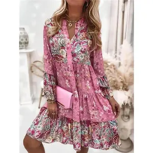 Women’s vintage smock dress with ditsy floral patchwork and tiered layers, boho flounce-sleeve short dress for everyday wear, ladies’ dress suitable for spring and fall outfits for women in their mid-twenties.